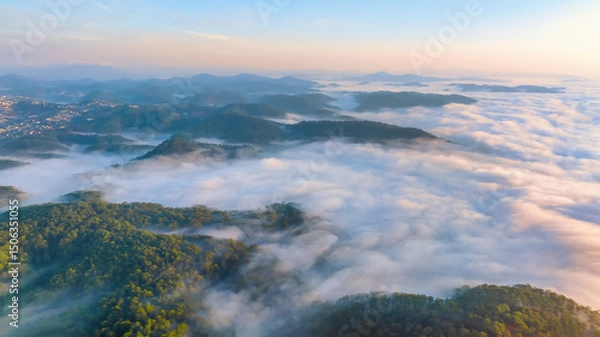 Obraz Aerial view of the Cau Dat suburbs near Da Lat city at morning with misty sky in Vietnam highlands