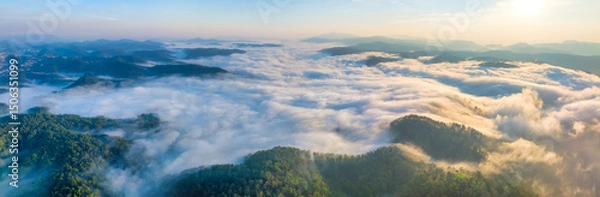 Obraz Aerial view of the Cau Dat suburbs near Da Lat city at morning with misty sky in Vietnam highlands