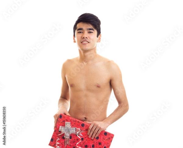 Obraz Undressed young man holding present
