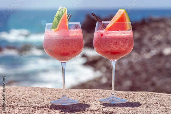 Obraz refreshing watermelon smoothie on a hot day at the beach on vacation concept