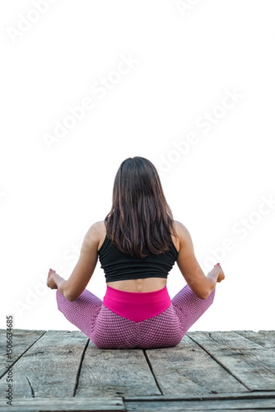 Obraz Woman meditating on a wooden surface in yoga pose,back view, isolated on a transparent background