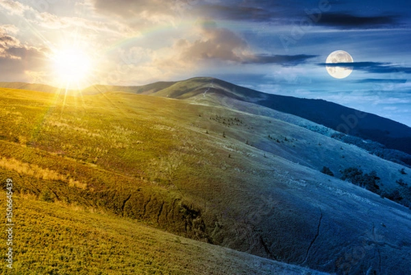 Fototapeta mountain landscape with green meadows on summer solstice. day and night time change concept. picturesque wallpaper of conceptual travel destination with sun and moon at twilight. distant great peak