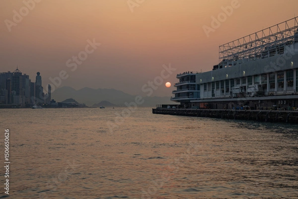 Fototapeta Beautiful sunset at Tsim Sha Tsui, Hong Kong
