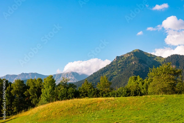 Obraz Landscape of the rural area. Rolling clouds over the mountains
