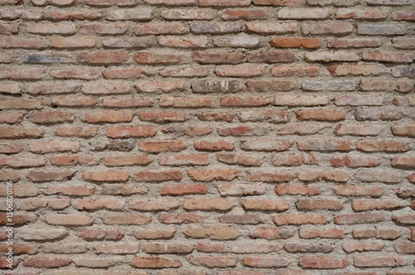 Fototapeta Old brick wall background, with long thin bricks