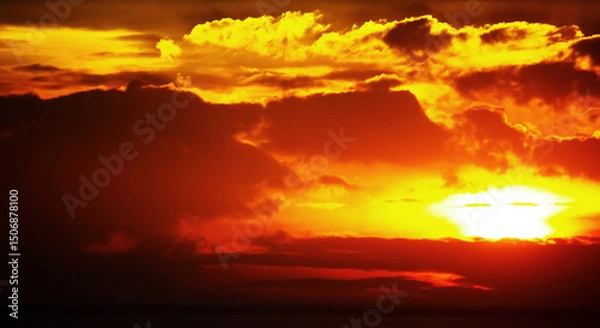 Fototapeta The twilight sky phenomenon shows a sky that is as hot as fire with glowing clouds. Image use for natural abstract background and meteorology forecast presentation.
