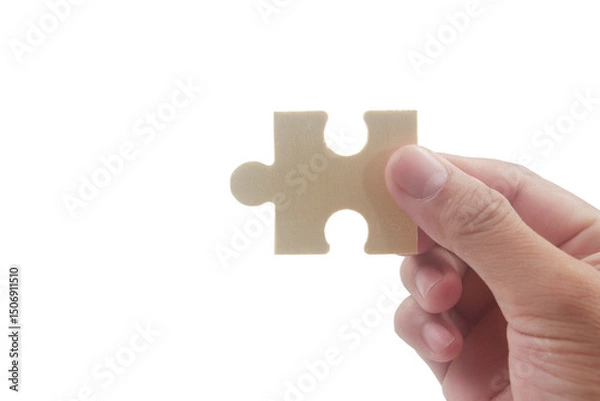 Fototapeta Puzzle piece placement creative workspace image minimalist background close-up problem solving concept