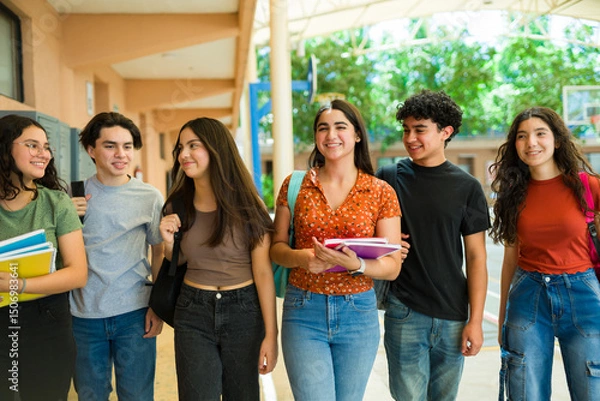 Obraz Happy high school students walking and talking together