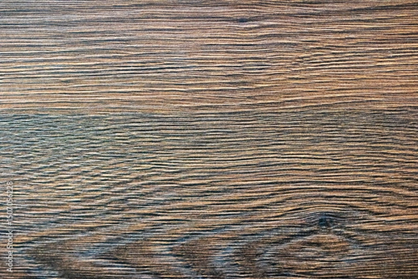 Fototapeta A detailed closeup of a wooden surface with a striking striped pattern