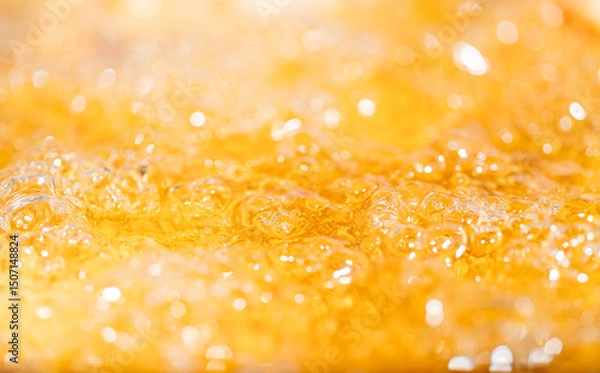 Fototapeta Close up bright orange Oil or beer splash texture and nature waves, Beautiful waves curve and little bubbles smooth for graphic design and background, Oil Bubbles, Soft beer bubbles, Selective focus