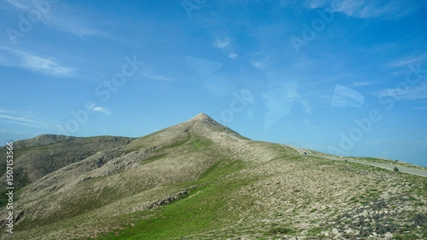 Fototapeta 01_This is a wide panorama of the famous Tomb of King Antiochus I Theos on Mount Nemrut in Turkey.
