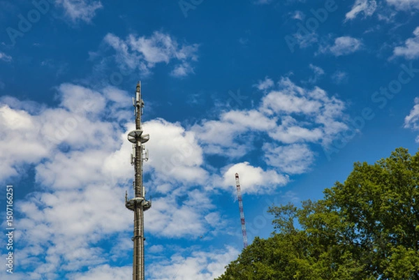 Fototapeta telecommunication radio tower antenna future broadband concept satellite connect clouds