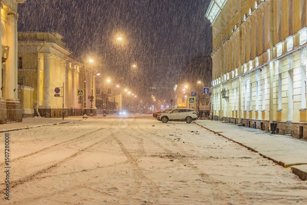 Obraz City street of the historical center at snowfall time.