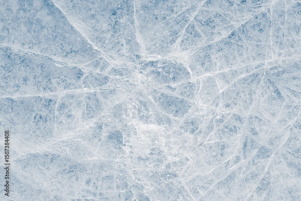 Fototapeta Crystalized ice background texture with cracks in a web-style in a light-blue tone.