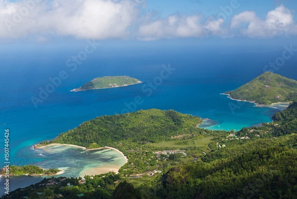 Obraz The view on the coastline with beaches and green hills, islands and blue Indian Ocean from the top of the mountain Morne. Mahe, the Seychelles