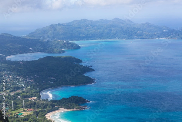 Obraz The view on the coastline with beaches and green hills, islands and blue Indian Ocean from the top of the mountain Morne. Mahe, the Seychelles