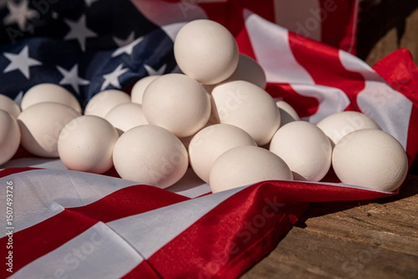 Fototapeta Chicken eggs with the US flag in the background. Countryside outdoor setting