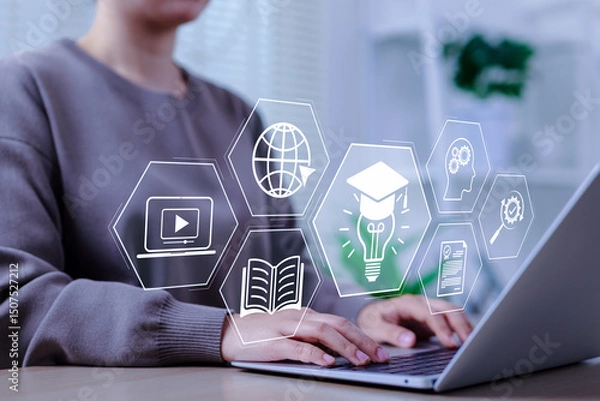 Fototapeta Online education and e-learning concept. A person use a laptop with icons representing online education, learning, knowledge sharing, educational tools, training, webinar on internet, digital courses,