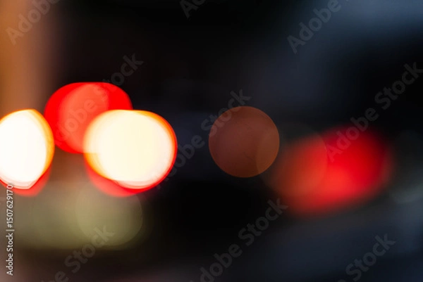 Fototapeta Abstract Blurred Red and Orange bokeh background image. Abstract circles used for creative design, presentation, or digital art projects.