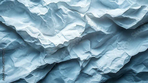 Fototapeta Crumpled texture. Paper waves. Blue hue. Light reflects on folds