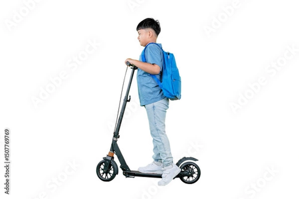 Fototapeta Schoolboy Riding Scooter with Blue Backpack Side View