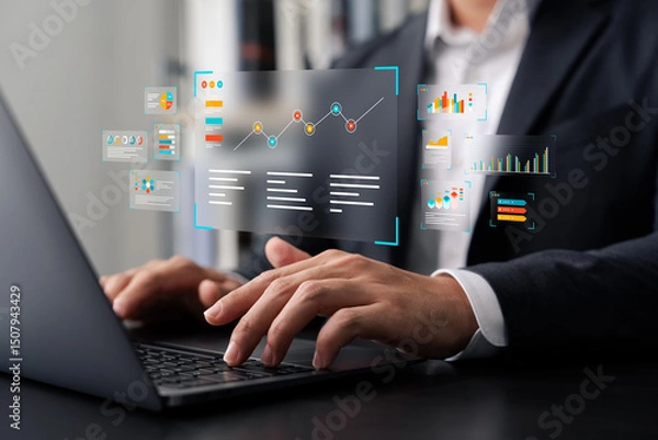 Fototapeta Businessman analyzing digital data analytics dashboard on laptop with futuristic graphs and charts, representing modern business intelligence, statistics, and financial technology.