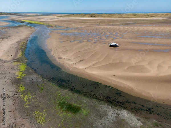 Fototapeta Low tide near Ravenglass on the coast of Cumbria in the northwest of England