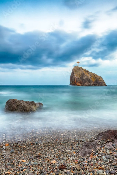 Fototapeta Amazing view of the beach and rocks shot with a long exposure.