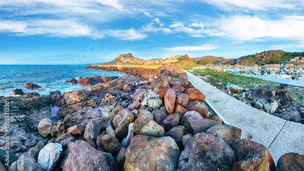 Fototapeta Unbelivable view of Medieval town of Castelsardo. Cityscape of Castelsardo port.