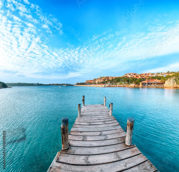 Fototapeta Unbelivable view of Porto Cervo from wooden pier.