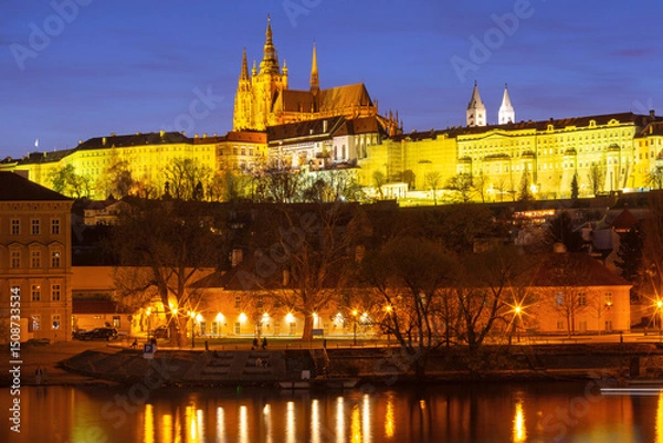 Fototapeta Illuminated St Vitus Cathedral at sunset in Prague Czech Republic