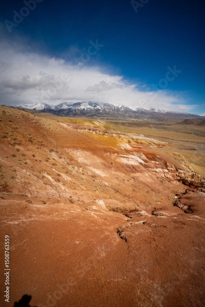Obraz Panoramic view of red and yellow mountains with canyons and gorges at Mars Altai Russia. Popular tourist destination showcasing unique colorful geological formations.