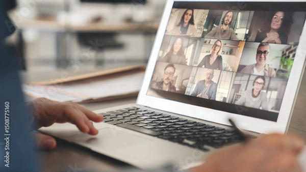 Fototapeta Working and talking on the computer with video calling