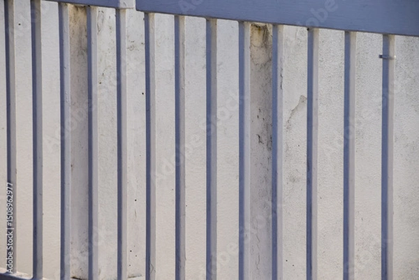 Fototapeta Close-up of metal corrugated board. Fence from corrugated board. Texture of metal fence. For background use.