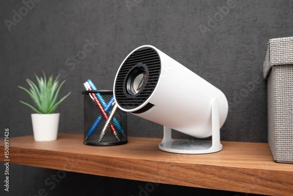 Fototapeta White projector with a lens on shelf