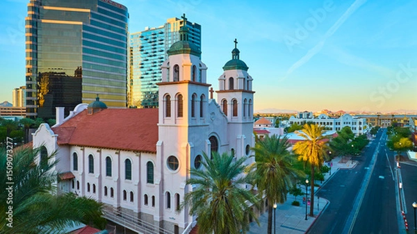 Fototapeta Aerial St Mary's Basilica with Palm Trees and Skyscrapers Phoenix Golden Hour