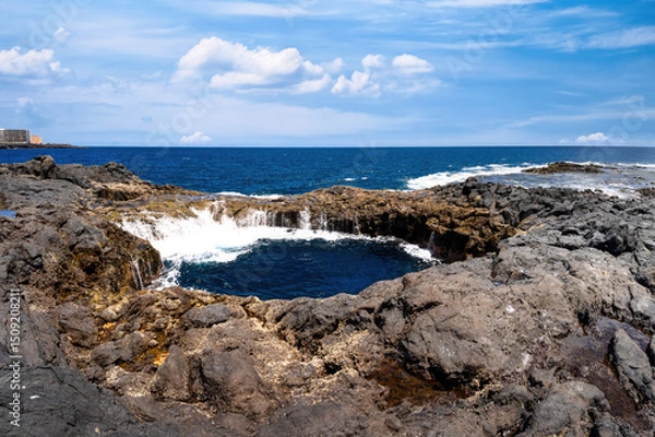 Fototapeta The Bufadero de La Garita is a coastal volcanic formation located in the municipality of Telde, Gran Canaria.