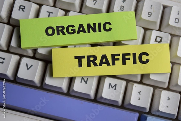 Obraz Concept of Organic traffic write on sticky notes isolated on keyboard.