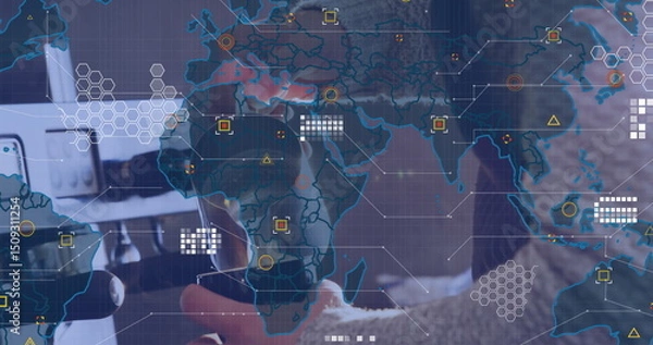 Obraz Image of data processing and world map over mid section of male barista preparing coffee at cafe