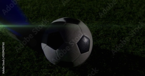 Obraz Image of light trails over football player kicking ball at stadium