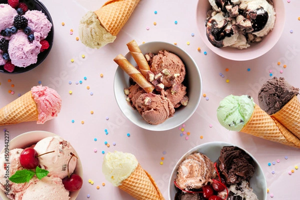 Obraz Summer ice cream table scene. Bowls and cones of colorful assorted flavors. Top view on a soft pink stone background.