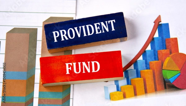 Fototapeta PROVIDENT FUND - words on multi-colored wooden blocks on the background of charts
