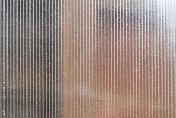 Obraz Close-Up of Translucent Ribbed Plastic Panel with Soft Light and Shadow