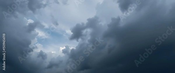 Fototapeta plane flying through a cloudy blue sky