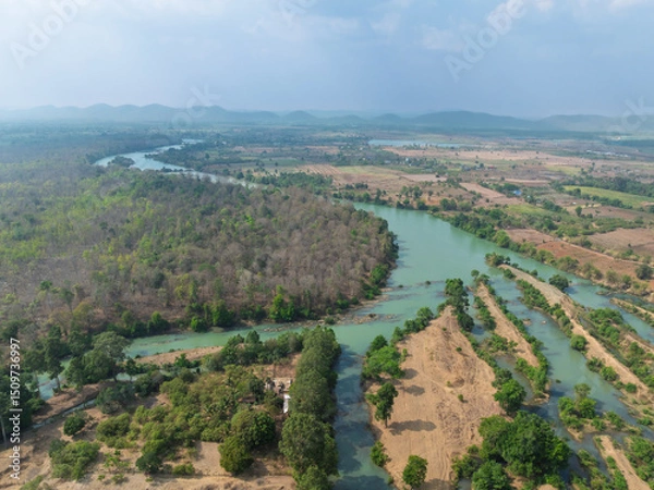 Fototapeta Scenic aerial view of Buon Don district in Dak Lak province, Vietnam showcasing winding rivers and lush green landscapes