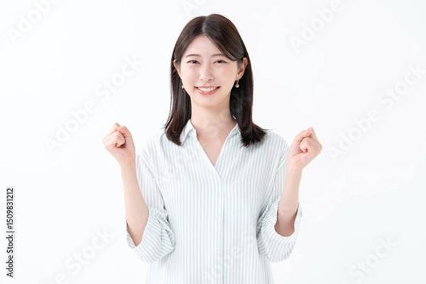 Obraz ガッツポーズをする女性