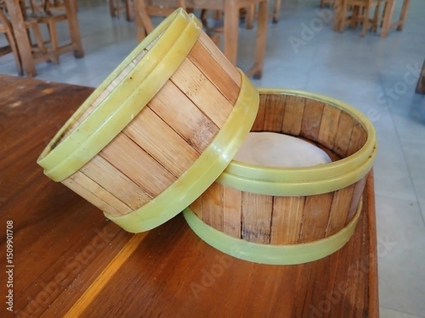 Fototapeta A circular bowl made of yellow bamboo is usually used to serve food to make it look more attractive.