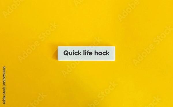 Fototapeta Quick Life Hack Phrase on Letter Tile on Yellow Background – Minimalist Tip and Productivity Concept