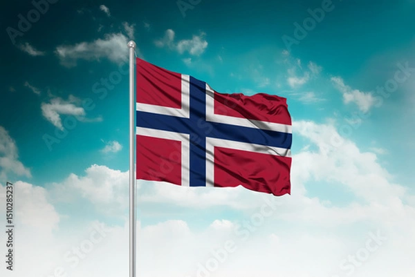 Obraz High-resolution stock image of a gently billowing Norway national flag mounted on a modern flagpole against a dramatic sky backdrop, symbolizing unity, patriotism, and global connection.