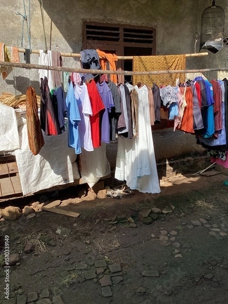 Obraz clothes drying in the sun with bamboo 
